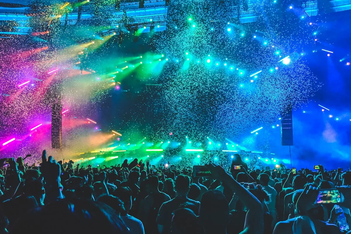 Concert crowd and stage lights—generic editorial metaphor for a major album release; not Drake, OVO, or album artwork.