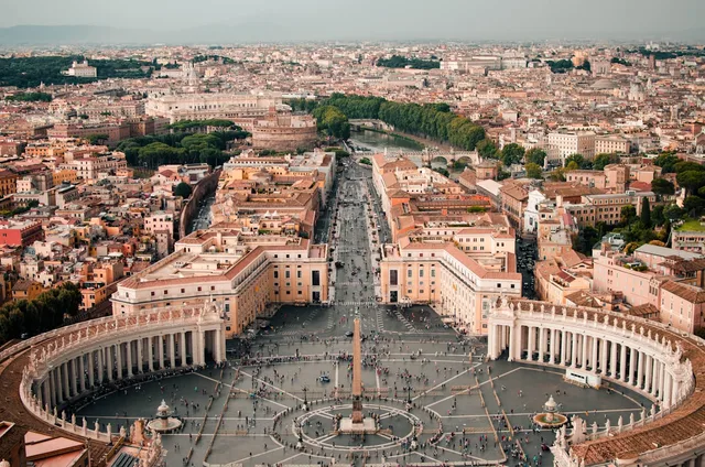 Rome cityscape with St Peter's Basilica dome at sunset, illustrative backdrop for the Italy-US-Vatican triangle over the Iran war and Pope Leo XIV