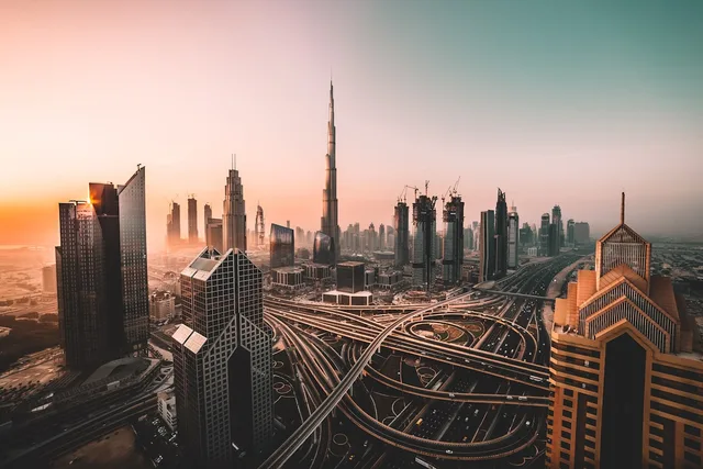 Abu Dhabi skyline at dusk—illustrative imagery for India–UAE diplomacy reporting; not an official photograph of the May 2026 visit.