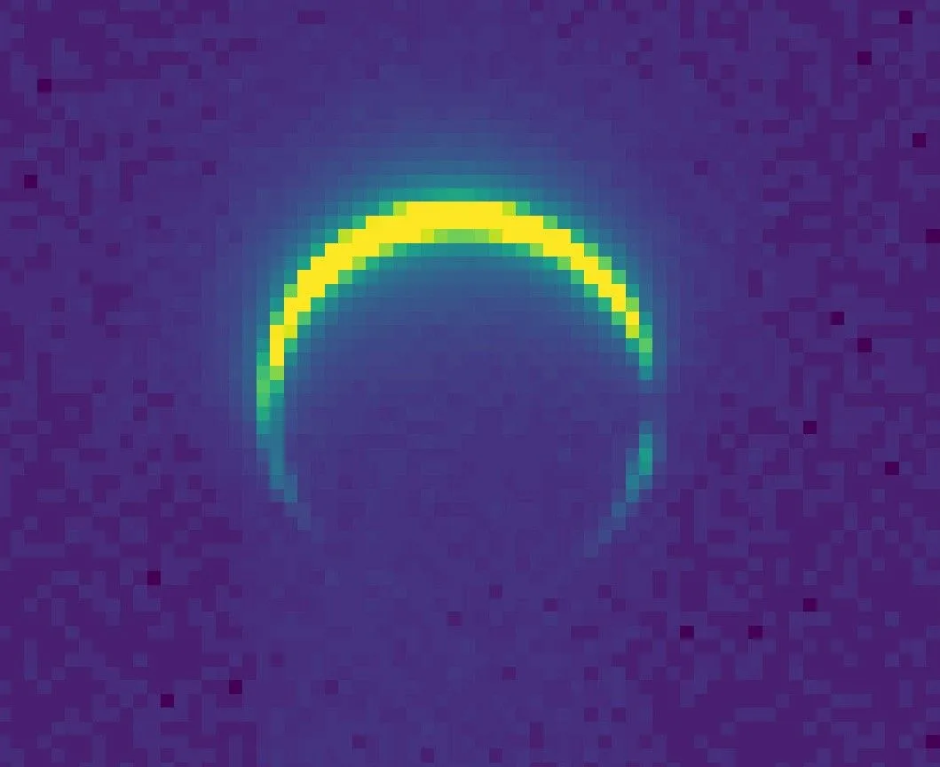 Colorized view of Mars as a thin crescent, captured by NASA’s Psyche spacecraft on May 3, 2026, from about 3 million miles away while approaching for a gravity assist; credits NASA/JPL-Caltech/ASU.