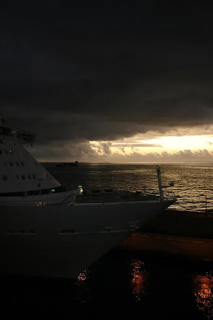 Cruise vessel in Tenerife port waters, illustrating the controlled disembarkation and repatriation operation