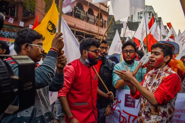 Crowd and colour at a public gathering in Kolkata, West Bengal, evoking the electoral theatre framing Adhikari’s long political arc